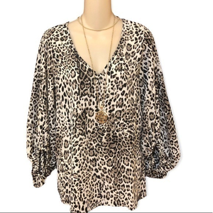 ee:some leopard print top with‎ puff sleeves